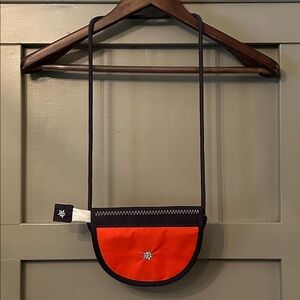 Sherpani Uno Mini Crossbody Shoulder Strap Travel Bag Purse Orange Brown